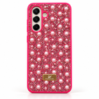 samsung galaxy a16 case in pink colour with rhinestones and pearls on it on white background