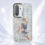 White glitter butterfly phone case with pearl-style details and raised decorative accents