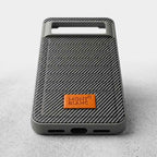 Grey carbon-fiber-style leather-texture case for Google Pixel 8, rear view with port cutouts
