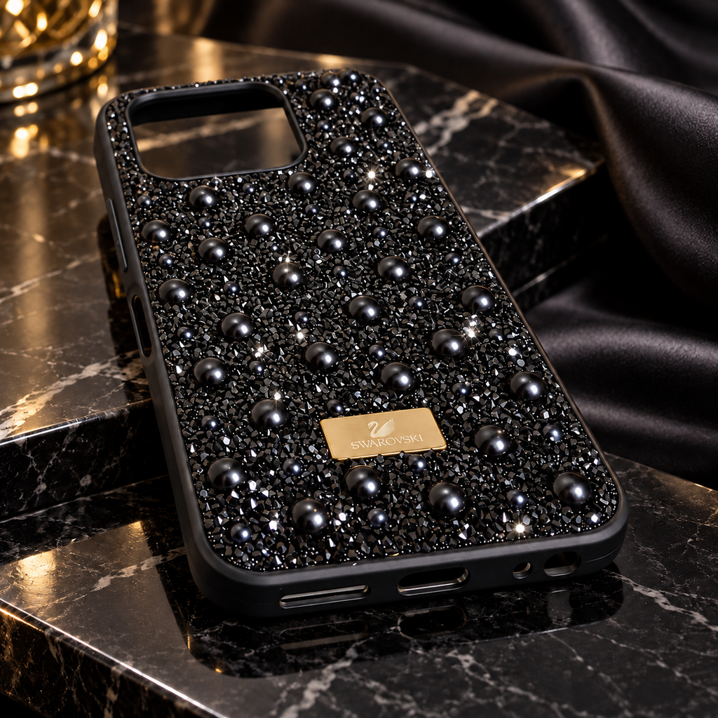 Black pearl and rhinestone-style fashion phone case on dark marble