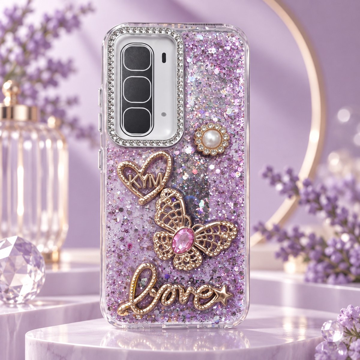 Purple glitter butterfly phone case design with raised 3D charms, silver camera bezel and clear TPU sides