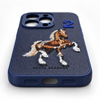 Navy blue iPhone 15 Pro embroidered horse case close-up showing the bottom port and speaker cutouts