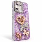 Purple OPPO A6 glitter case with pearl heart bow and butterfly decorations, angled studio view