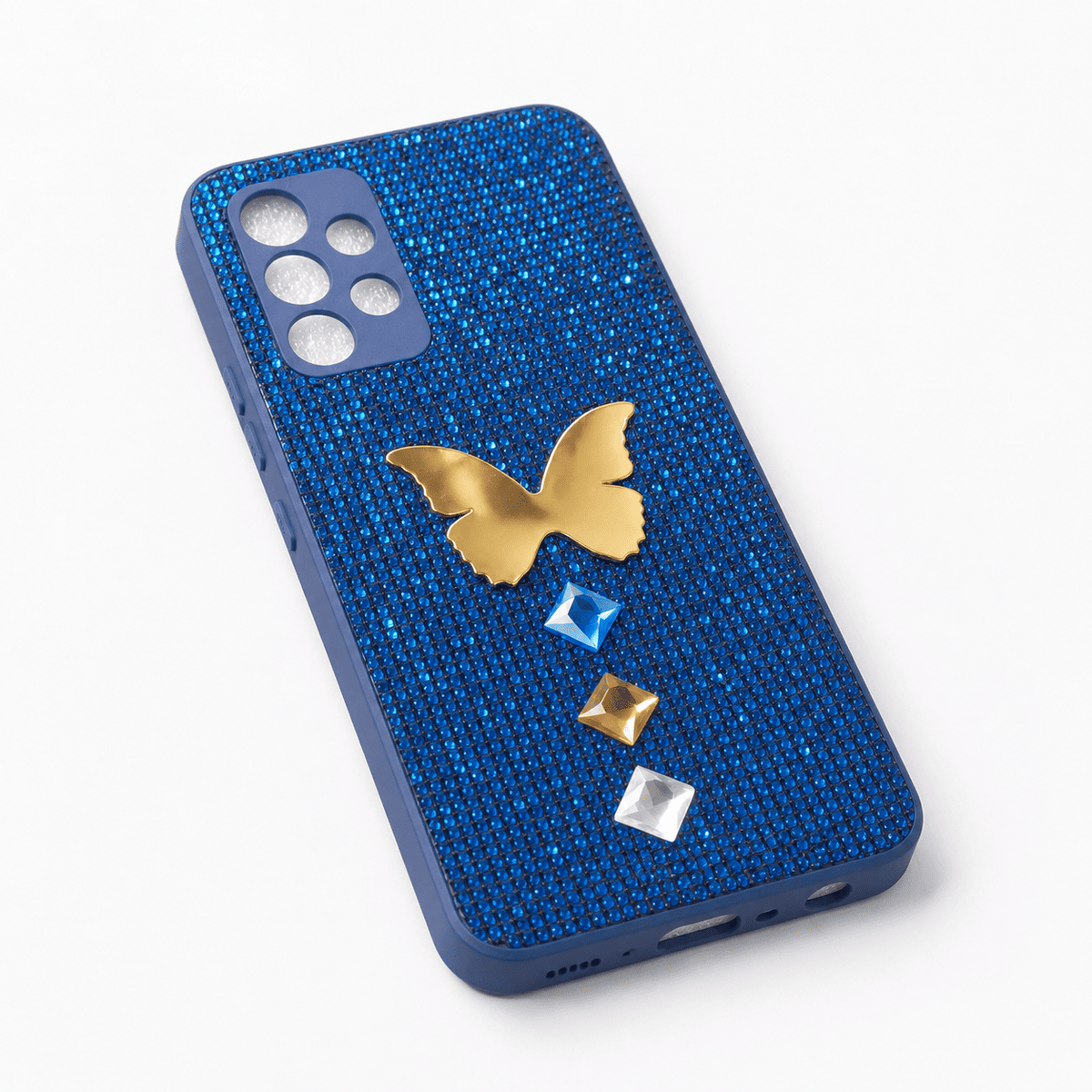 Samsung Galaxy A32 4G blue glitter cover angled view showing butterfly and crystal details