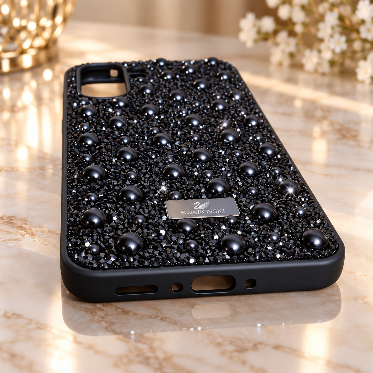Black rhinestone and pearl Samsung Galaxy A36 5G case showing bottom port and speaker cutouts