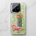 Fancy glitter phone case with raised 3D butterfly, pink bow and pearl-style accents