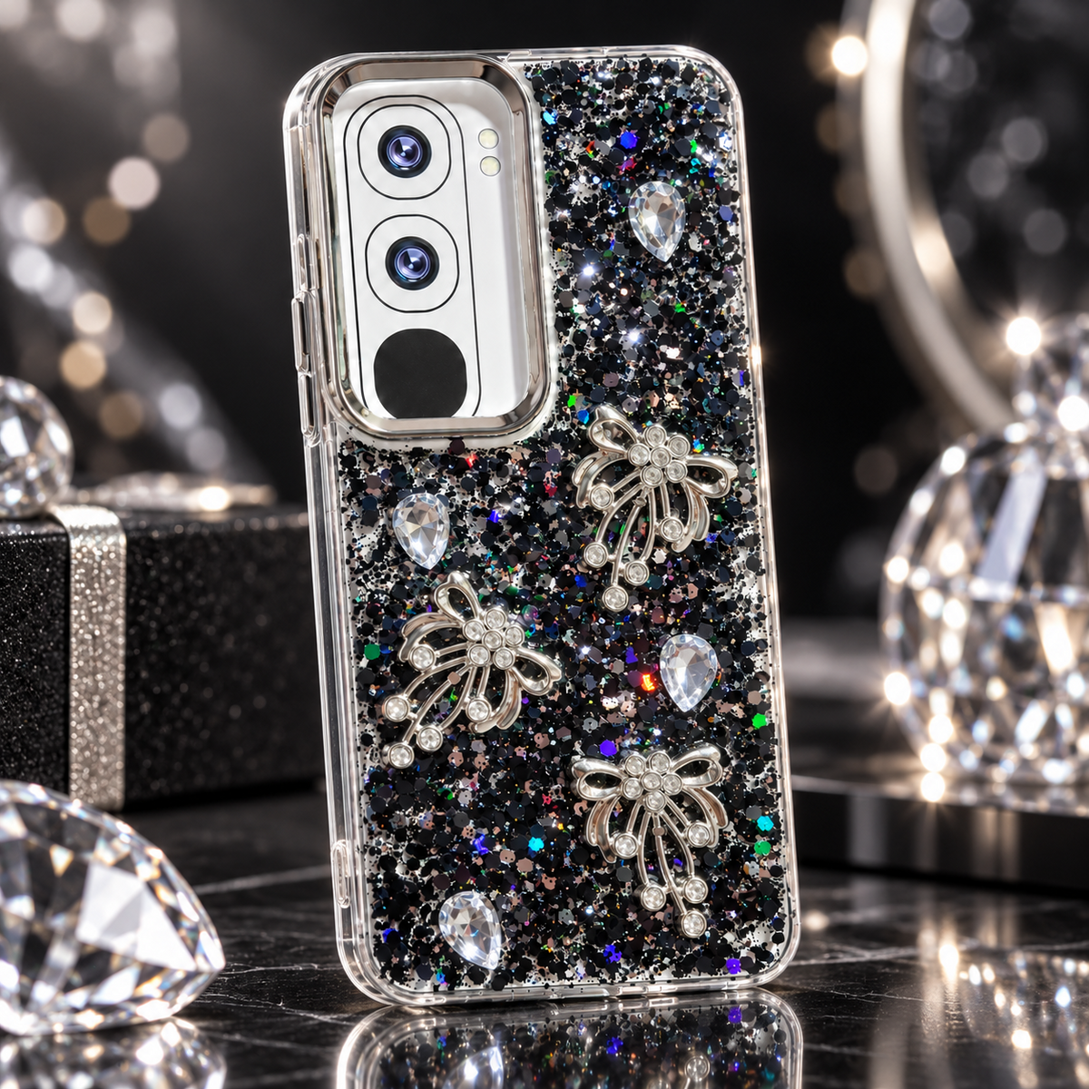 Vivo Y21d black glitter back cover with three rhinestone-style bow charms and faceted stone accents, lifestyle view